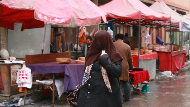 A Uighur woman in Kashgar, Xianjing. China watches every step Muslims take in the region.