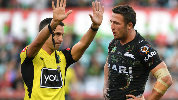 Referee Matt Cecchin sends Sam Burgess to the sin bin.