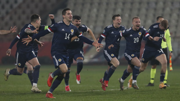 Scotland celebrate their penalty shootout victory over Serbia at the Rajko Mitic stadium in Belgrade which earned them qualification for the Euros, after a 23-year absence from major men’s tournaments.