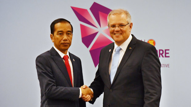 Australia's Prime Minister Scott Morrison and Indonesia's President Joko Widodo at a bilateral meeting during the 2018 ASEAN Summit in Singapore, on  November 14.