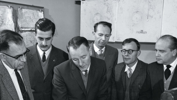 Henry Phillpot (third from left) and American, Argentinian and French colleagues examining Southern Ocean weather charts in the International Antarctic Analysis Centre in
Melbourne, 1962.