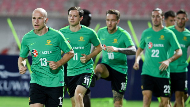 Members of the Socceroos squad train in Kuwait ahead of the qualifier.