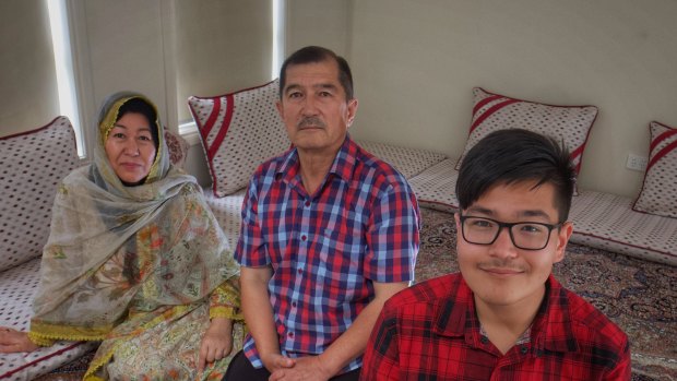 Dandenong High School dux Abdul Basit at home in Doveton with his parents, Jamila and Sajjad Ahmad. The family emigrated from Pakistan as refugees in 2018.