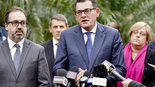 Victorian Premier Daniel Andrews (centre) with Attorney General Martin Pakula and Police Minister Lisa Neville.