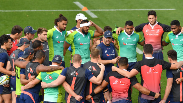 Outside chances: The Wallabies get tight during training at Ballymore.