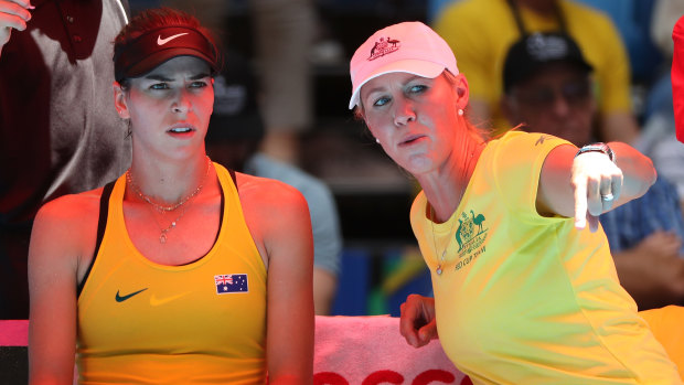 In the spotlight: Australia's captain Alicia Molik talks with Ajla Tomljanovic. 