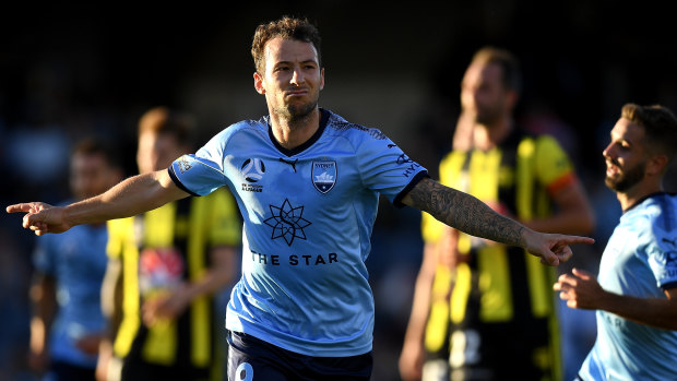 Calm and collected: Adam Le Fondre celebrates after converting from the spot at Campbelltown Sports Stadium.
