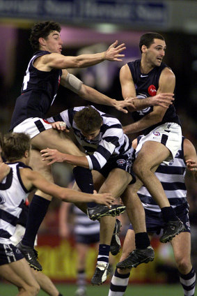 Carlton flies high above Geelong in the last quarter but were not able to snatch the game.