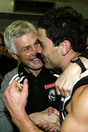 Mick  Malthouse and Paul Licuria celebrate the 2002 qualifying final win over Port Adelaide.