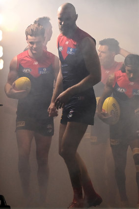 Max Gawn leads out the Demons.