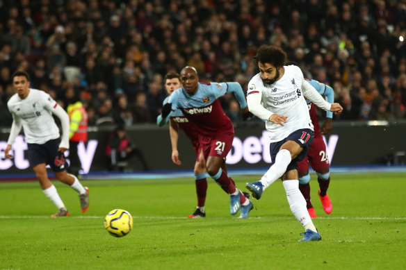 Mohamed Salah scores from the penalty spot against West Ham. 
