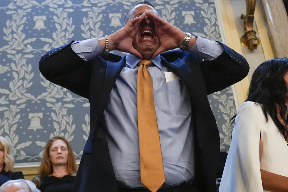 Someone interrupts President Joe Biden as he delivers his State of the Union address to a joint session of Congress.