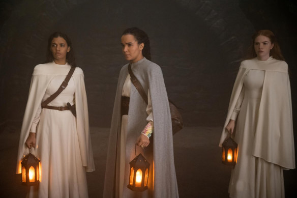 Madeleine Madden (left) with Zoe Robins and Ceara Coveney in season two of The Wheel of Time. 