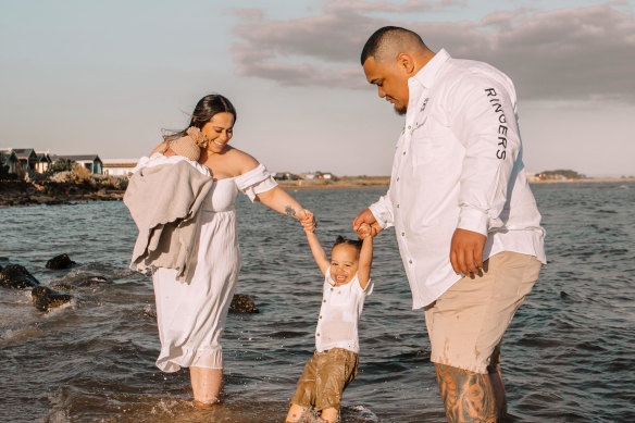 JJ Taiki and his partner with their sons, Unakea and Izaac. JJ Taiki took part in the Moomba Birdman Rally to raise money for an autism charity.