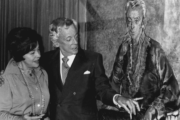 Sir Robert Helpmann and artist Judy Cassab as they inspect his portrait at its unveiling in the southern foyer of the Opera House on September 16, 1976.