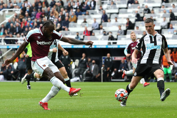 Michail Antonio scores for West Ham against Newcastle at St James Park on Sunday.