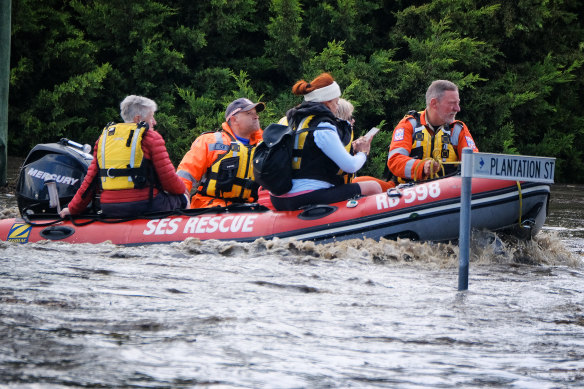 SES rescuers move Maribyrnong residents to higher ground last October.