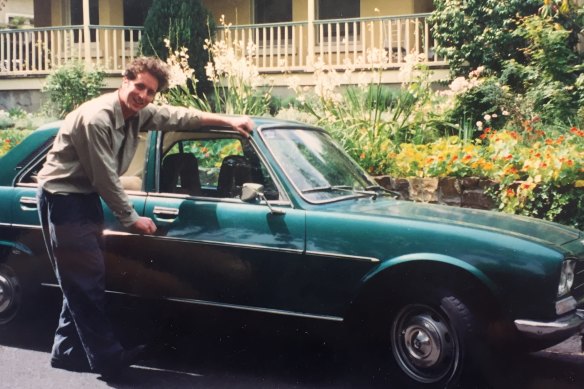 Dugald Jellie and with his previous car, a 1976 cosmic-green Peugeot 504.