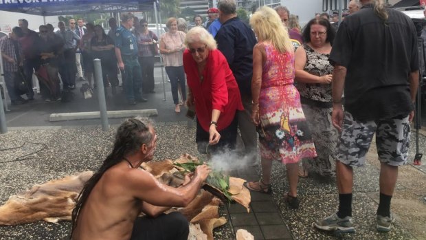 The smoking ceremony held to free the spirits of the 15 victims of the Whiskey Au Go Go fire bombing.