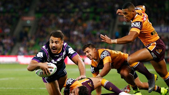 Not bad for openers: Jahrome Hughes crosses for the Storm for the first try of the season.