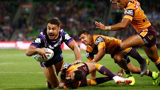 Jahrome Hughes crosses for the Storm for the first try of the season.