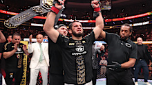 Islam Makhachev celebrates his UFC title defence.