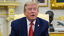 Donald Trump speaks in the Oval Office.