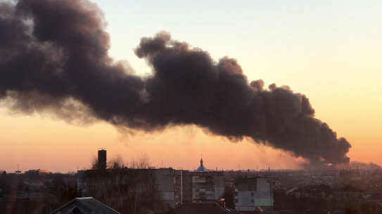 A cloud of smoke rises after an explosion in Ukraine.