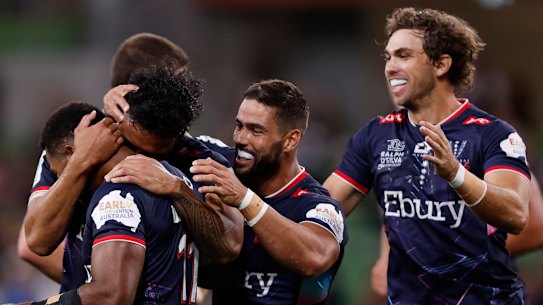 Filipo Daugunu of the Rebels celebrates a try during the round two Super Rugby Pacific match.