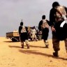 AQIM (Al-Qaeda in the Lands of the Islamic Maghreb)  fighters in a propaganda video, somewhere in the Sahara Desert in 2017.