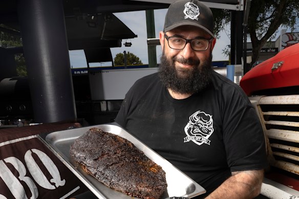 George Hatzigeorgiou with his slow-cooked brisket.
