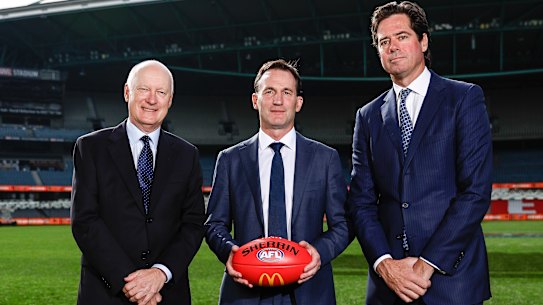 AFL Commission chair Richard Goyder, incoming CEO Andrew Dillon and outgoing chief Gillon McLachlan. Dillon is keen to bring in football experience. 