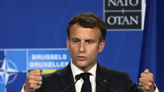 French President Emmanuel Macron speaks at the end of a NATO summit in Brussels.