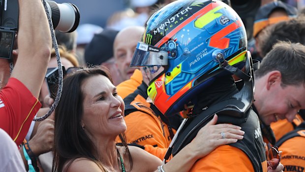 Oscar Piastri embraces his mother, Nicole, after his win in Baku.