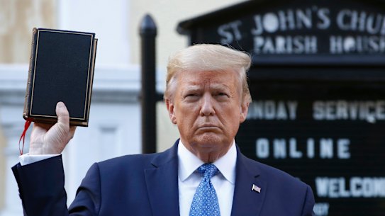 Then-president Donald Trump holds a Bible as he visits St. John’s Church at Lafayette Park near the White House in 2020.