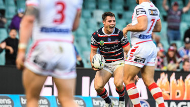 The general: Cooper Cronk enjoys his march to the try line.