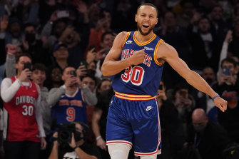 Stephen Curry reacts to a three-pointer against the Knicks, in the game where he claimed the NBA record for three-pointers.