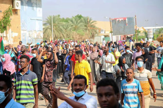 Thousands of protesters flooded the streets of Khartoum after the coup.