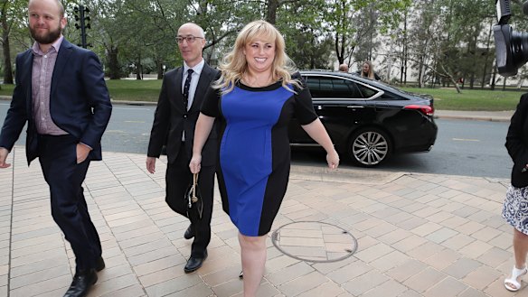 Deliberately demure ... Rebel Wilson, who sued Bauer Media for defamation, outside court in Sydney last year.