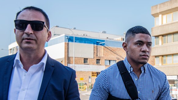 Manase Fainu, right, heads to court alongside his manager Mario Tartak.