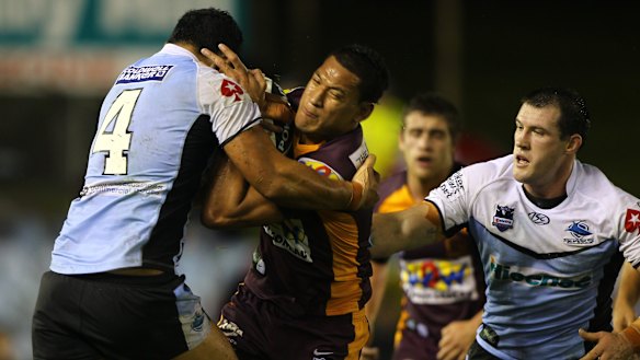 Past glory: Israel Folau in action for the Broncos against the Sharks in 2010.