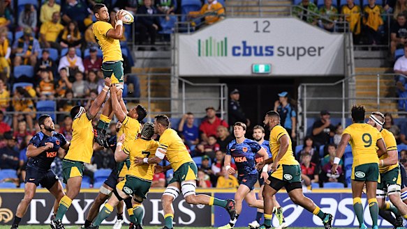 Brave face: Tui, winning the lineout ball, was playing after the death of his step-father. 