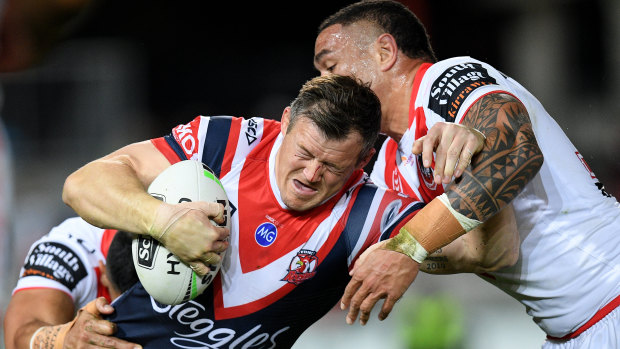 Brett Morris helps the Roosters to a 34-12 win against the Dragons at Jubilee Oval on Saturday night.