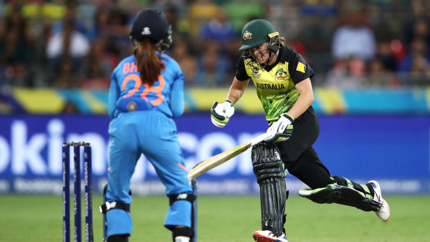 Alyssa Healy scrambles between wickets in the loss to India.