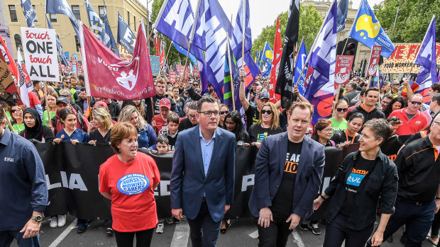 Premier Daniel Andrews leads the Melbourne rally with nurses' union leader Lisa Fitzpatrick, Luke Hilakari from Trades Hall and ACTU secretary Sally McManus.