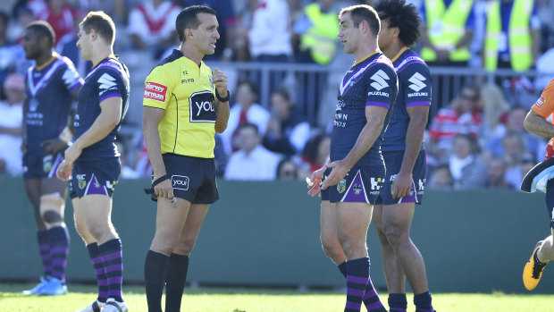 Controversy: Matt Cecchin fields a complaint from Storm captain Cameron Smith after the Josh Addo-Carr no-try.