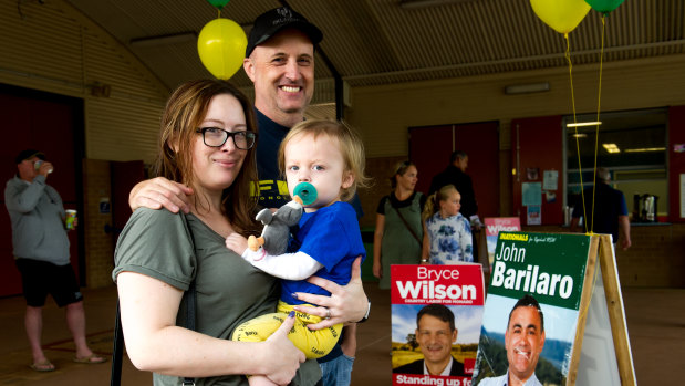 Voters Felicity and Peter Kennedy with son Jackson at Jerrabomberra Public School on Saturday.