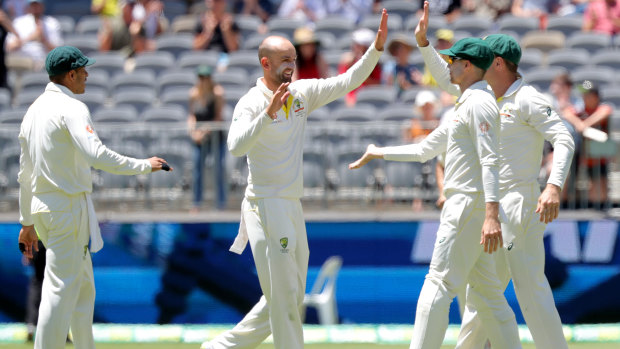 GOAT: Nathan Lyon claims one of his eight wickets of the match.