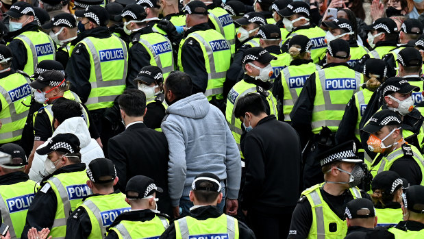 Two men detained by the Home Office are released after protesters blocked the immigration van from leaving Kenmure Street in Glasgow, Scotland. 