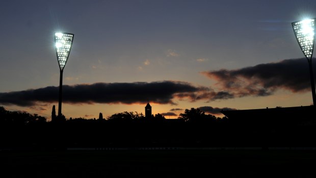 Manuka Oval's lights being turned on for the first time.